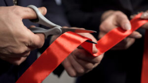 Business,People,Hands,Cutting,Red,Ribbon,Close-up,,New,Project,,Opening